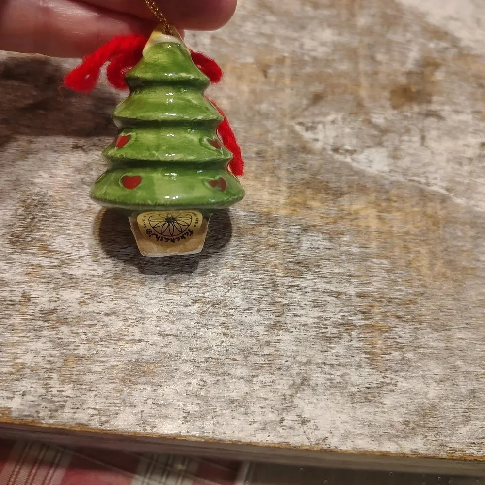 Festive Green Christmas Tree Ornament with Red Accents